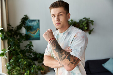 Young man with prosthetic leg confidently poses in a modern living space surrounded by plants