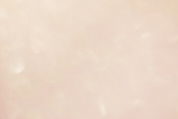 Soft beige sparkle bokeh effect lights or background © Irina