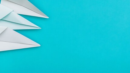 Fototapeta premium White Paper Airplanes on a Blue Background