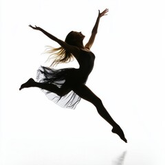 A silhouette of a dancer leaping gracefully against a bright background, capturing the essence of movement and artistic expression.