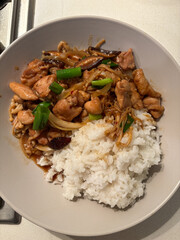 Rice with chicken mushroom stir-fry.