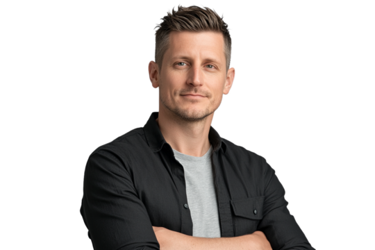 A young white man with dark hair,, wearing a black button-down shirt, standing with his arms crossed against a transparent background, transparent, png - Powered by Adobe