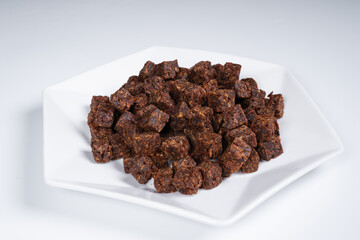 Cubes of spicy beef jerky