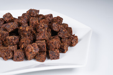 Cubes of spicy beef jerky