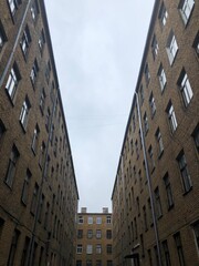 Narrow brick alleyway in urban setting