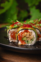 Delicious fresh sushi roll with cucumber, salmon