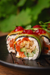 Delicious fresh sushi roll with cucumber, salmon