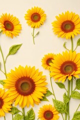 Fototapeta premium A collection of vibrant sunflowers arranged artistically on a light background.