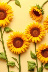 Obraz premium A vibrant arrangement of sunflowers on a yellow background, showcasing nature's beauty.