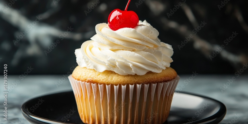 Poster a cupcake that is adorned with a generous layer of whipped cream and is finished off with a bright, 