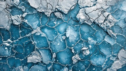 Frozen Fractured Landscape: A Stunning Aerial View of a Glacier's Surface