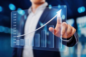 Businessman points at a graph of profit growth.