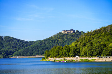 Fototapeta premium View of Waldeck Castle and the Edersee. Waldeck Castle. Old castle complex near Waldeck with the surrounding nature. 