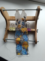 Beautiful floral beaded gerdan and weaving device