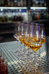 Whisky glasses for tasting on the bar of the restaurant