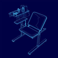 Blue medical chair with a desk underneath it. The desk has a bottle and a cup on it