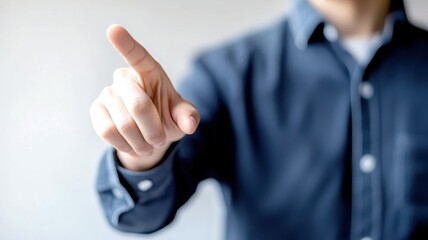 Person pointing with finger, indicating direction or emphasis.