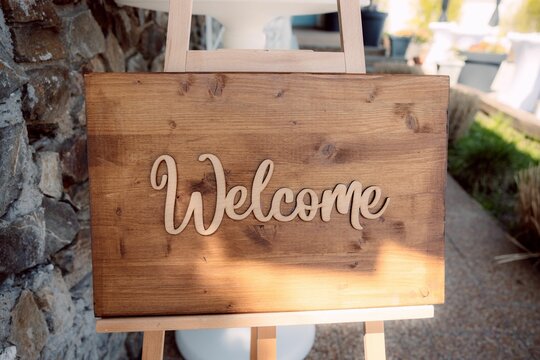 Rustic wooden Welcome sign on easel