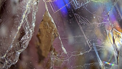 Macro photography of a topaz crystal with rainbow glow 7
