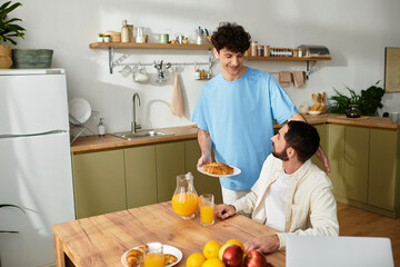 Morning moments shared by a gay couple enjoying breakfast in a modern kitchen
