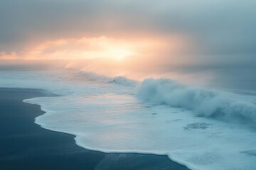 Fototapeta premium atmospheric coastal landscape misty morning seascape with gentle waves and soft sunlight breaking through maritime fog