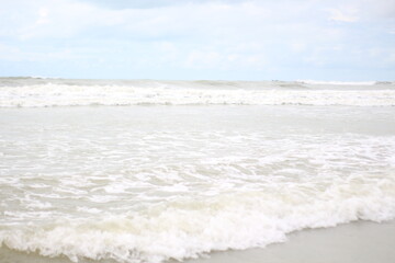 Baltic sea under the dark dramatic clouds after thunderstorm. Epic seascape. Cyclone, gale, storm, rough weather, meteorology, ecology, climate change, natural phenomenon. Grand Cayman island summer.