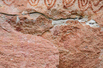 Pha Taem National Park, Ubon Ratchathani, Mekong River, see prehistoric paintings on the cliff, strangely shaped stone pillars and a small field of colorful flowers in late rainy season, early winter.