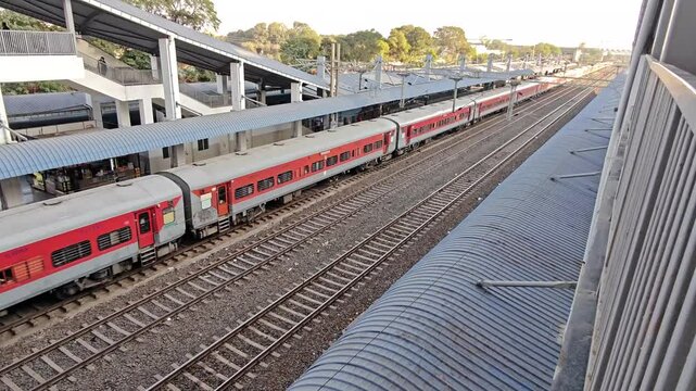 Passenger train moving through station in Bhopal
