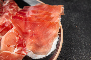 Jamon meat iberico or serrano snack aperitif fresh tasty food dish delicious gourmet food...