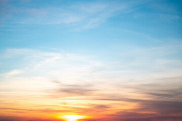 Sky,sunset, beautiful , luxury soft gradient orange gold clouds and sunlight on the blue sky perfect for the background, Sunrise on morning or everning in winter warm time ,Twilight summer,silhouette