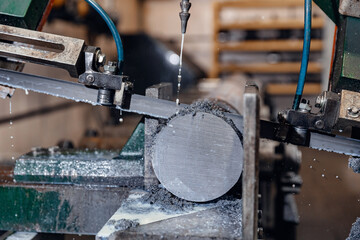 Band saw cutting machine cut metal blank with liquid coolant method, Industrial tool