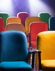 Obraz premium détail d'une salle de spectacle avec de beaux fauteuils confortables et colorés en ia