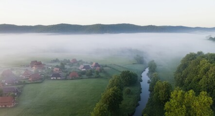 Foggy Morning Over a Countryside Village.