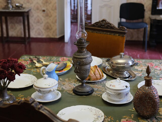 vintage porcelain dishes on the table, serving for dinner