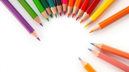 Colorful arrangement of sharpened colored pencils in semicircle on white background, creative design, copy space