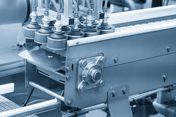 The high technology material handling process in canned food production by robotic system.