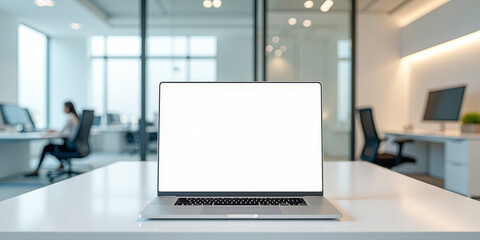laptop in the office with an empty white screen