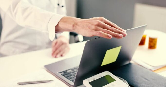 A healthcare professional is responsible for managing patient files, medications, and records in a clinical setting