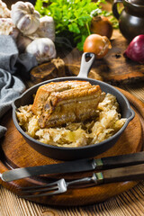 Traditional spare ribs baked in sauerkraut.