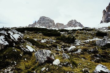 Partly snow-covered mountain landscape in the European Alps and the Italian Dolomites. Mountain...