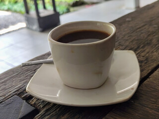 Latte, coffee, Vietnamese coffee served in cups on a wooden table.