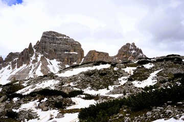 Partly snow-covered mountain landscape in the European Alps and the Italian Dolomites. Mountain...