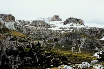 Partly snow-covered mountain landscape in the European Alps and the Italian Dolomites. Mountain...