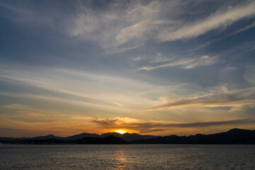 Obraz premium Sunset off the coast of Phuket near Ao Phang Nga National Park