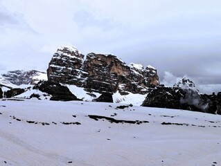 Partly snow-covered mountain landscape in the European Alps and the Italian Dolomites. Mountain...