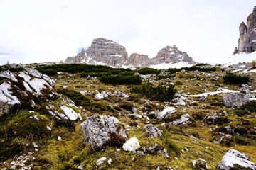 Partly snow-covered mountain landscape in the European Alps and the Italian Dolomites. Mountain...