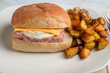 fried egg and spam  breakfast sandwich