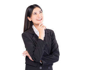 Professional young businesswoman in a black suit posing thoughtfully with a smile, looking upwards, perfect for corporate and conceptual themes