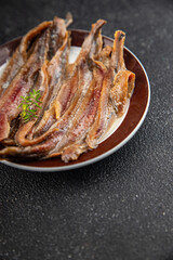 Anchovy fillet fish seafood snack aperitif fresh tasty food dish delicious gourmet food background on the table rustic food top view copy space pescetarian diet