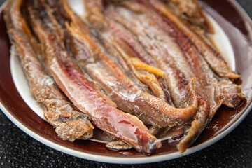 Anchovy fillet fish seafood snack aperitif fresh tasty food dish delicious gourmet food background on the table rustic food top view copy space pescetarian diet